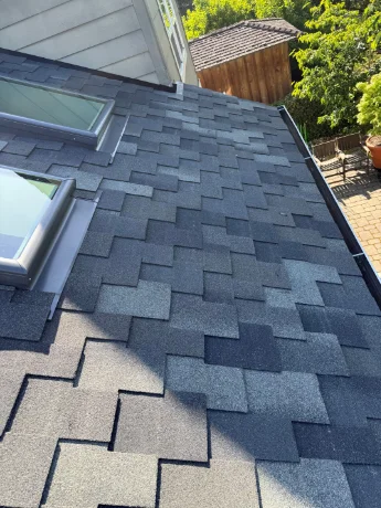 Premium GAF installed shingles by J&J Roofing & Construction