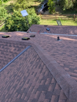 Full architectural tear-off and structural deck repair on a classic Irvington property to meet Multnomah County guidelines.