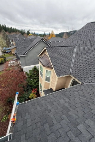 Certified GAF Master Elite roofers installing high performance Timberline HDZ shingles with a reinforced high velocity nailing zone