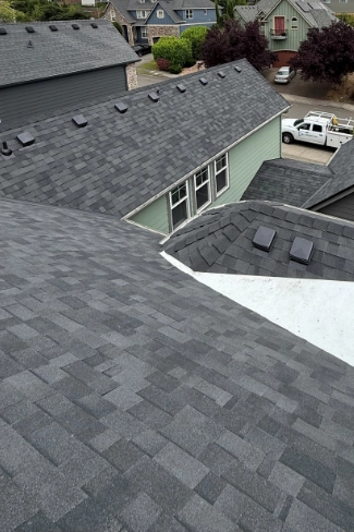 Premium architectural shingle roof replacement completed by J&J Roofing on a residential home located in the Altamont neighborhood.