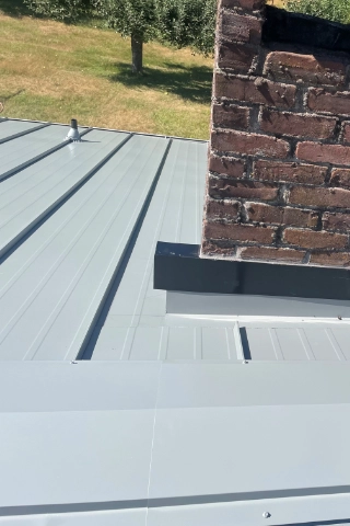 Standing seam metal roofing engineered to withstand high velocity wind patterns sweeping through the Columbia River Gorge corridor