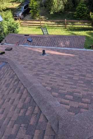 Premium architectural shingle roof replacement completed by J&J Roofing & Construction on a residential home in the Metzger neighborhood