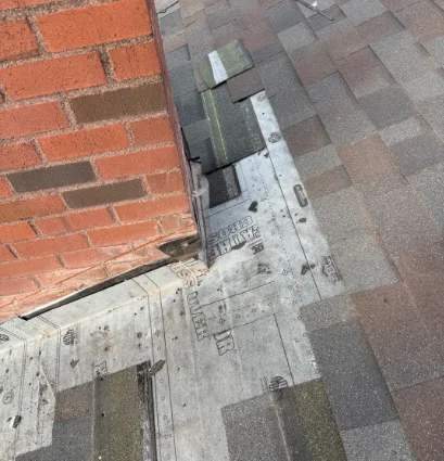 Flashing repair around chimney.