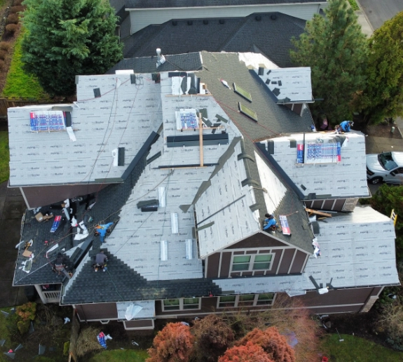 Drone view of new roof replacement being installed by J&J Roofing & Construction